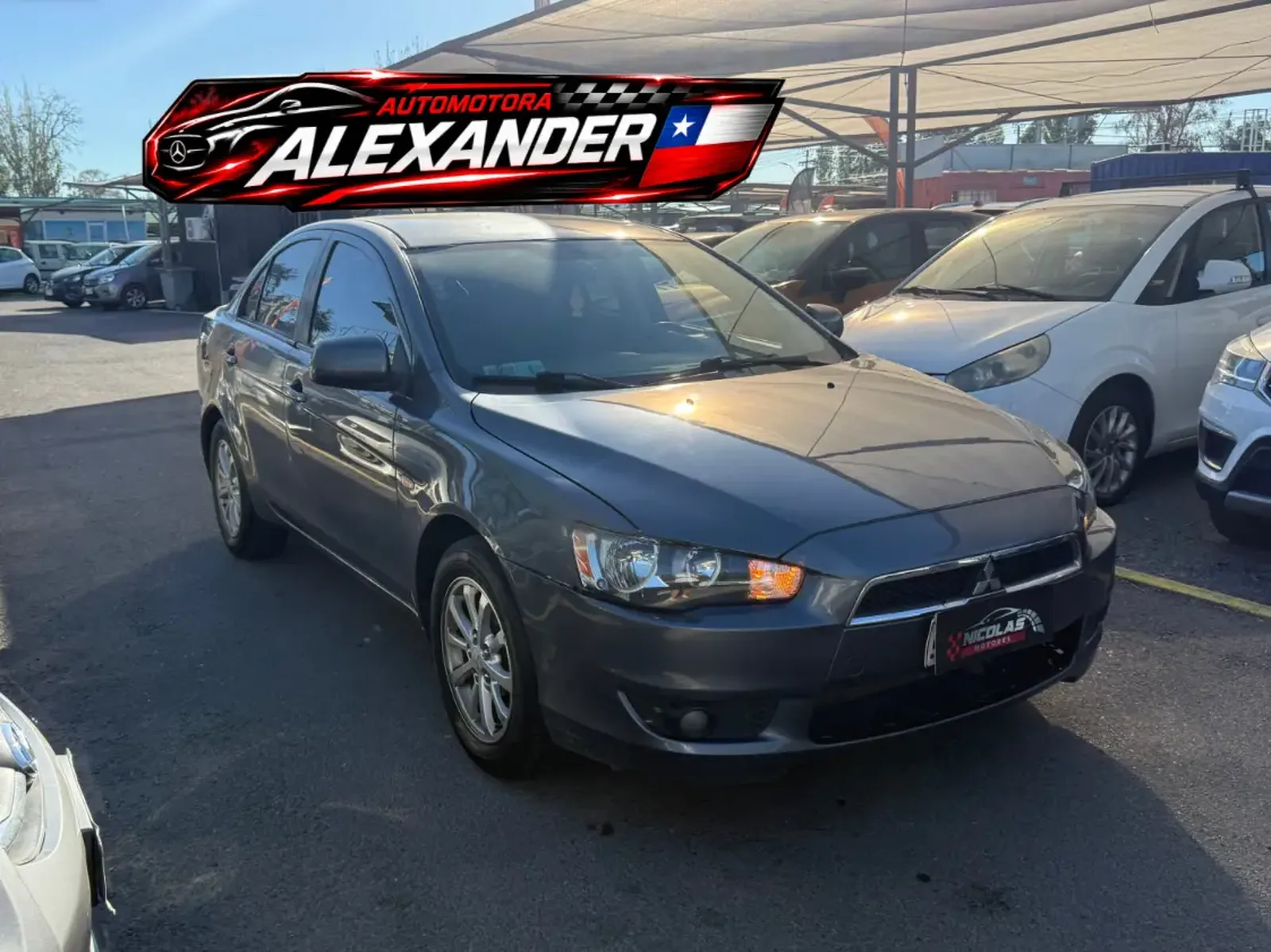 Mitsubishi Lancer 2012 — fotografía 1